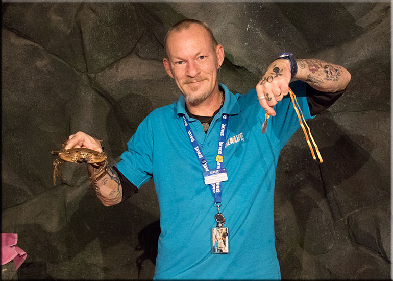Matt holding a crab