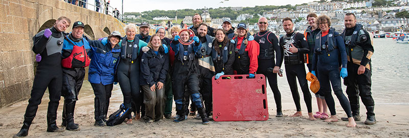 Cornish seal swims free after rescue from life-threatening frisbee entanglement